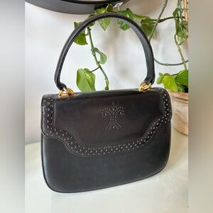 Vintage black top handle bag with gold hardware